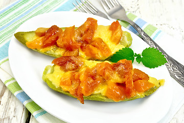 Image showing Courgettes in spicy sauce with dried apricots on napkin