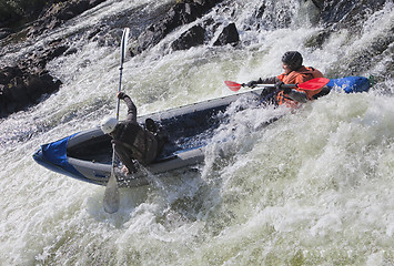 Image showing Kayakers in whitewater