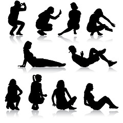 Image showing Silhouettes of people in positions lying and sitting. illustration.