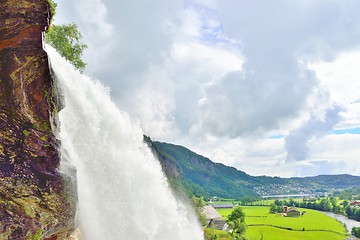 Image showing Steinsdalsfossen waterfall closeup and Norwegian countryside