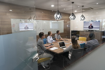 Image showing start up business people group attending videoconference call