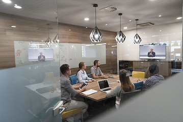 Image showing start up business people group attending videoconference call