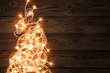 Image showing Glowing garland on empty background