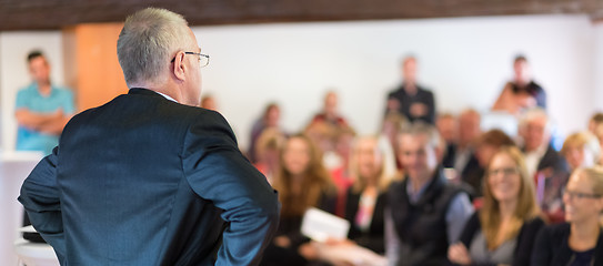 Image showing Authoritative boss scolding his employees.