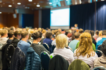 Image showing Audience in lecture hall participating at business event.