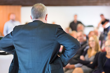 Image showing Authoritative boss scolding his employees.