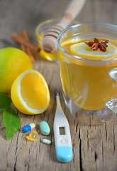 Image showing cup of tea, pills and tea