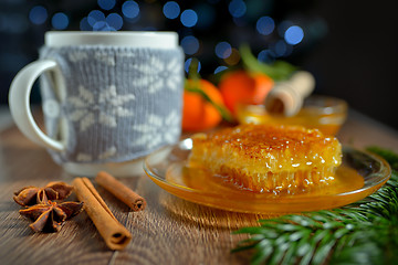 Image showing cup of hot tea with honey