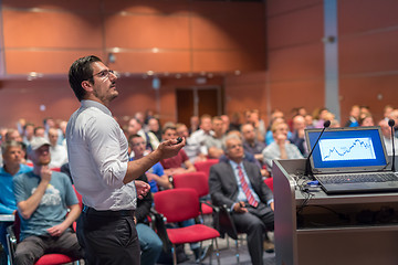 Image showing Public speaker giving talk at Business Event.