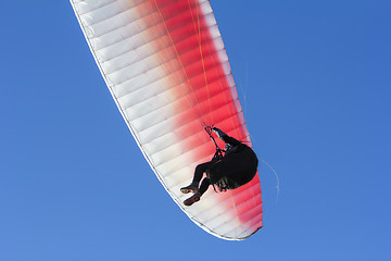 Image showing Paragliding on background of blue sky close-up