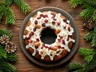 Image showing Christmas cake on wooden table