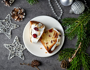 Image showing two pieces of christmas cake with fruits and nuts