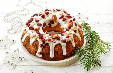 Image showing Christmas cake on white wooden table