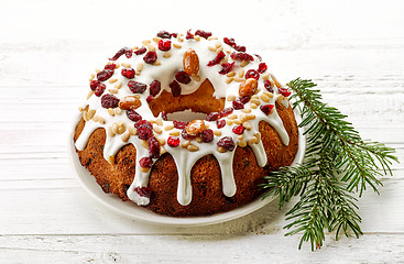 Image showing Christmas cake on white wooden table