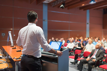 Image showing Public speaker giving talk at Business Event.