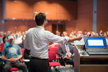 Image showing Public speaker giving talk at Business Event.