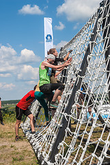 Image showing Team storms net wall in extrim race. Tyumen.Russia