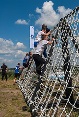 Image showing Team storms net wall in extrim race. Tyumen.Russia