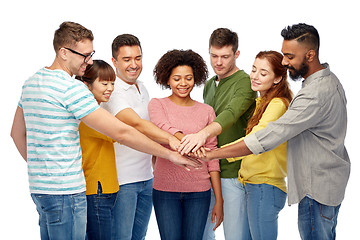 Image showing international group of happy people holding hands