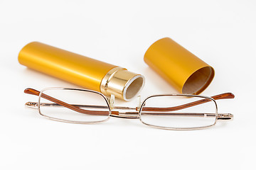 Image showing Glasses in gold case