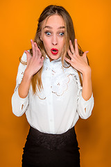 Image showing Portrait of young woman with shocked facial expression