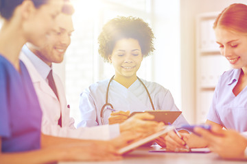 Image showing group of happy doctors meeting at hospital office