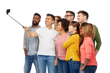 Image showing group of people taking selfie by smartphone