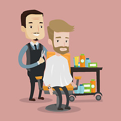 Image showing Barber making haircut to young man.