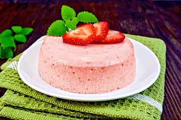 Image showing Panna cotta strawberry on dark board