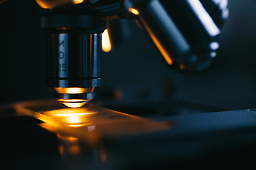 Image showing Close up of microscope and test sample