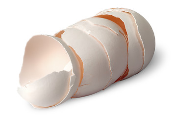 Image showing Stack of  halves from crashed eggs horizontally rotated