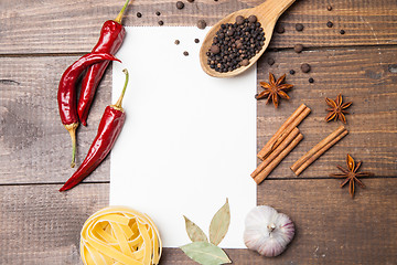 Image showing blank paper with pasta, pepper and spices