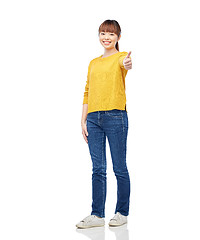 Image showing happy asian woman showing thumbs up