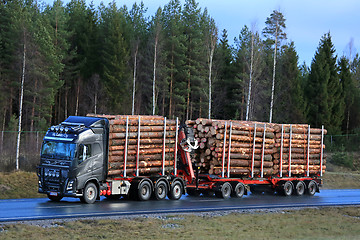 Image showing Volvo FH16 Transports Pine Timber on Motorway