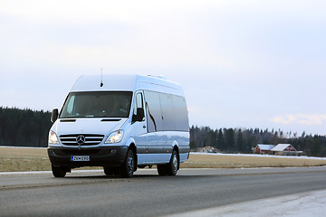 Image showing White Mercedes-Benz Sprinter Minibus on the Road