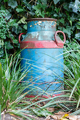 Image showing Old buckets milk, beautifully painted 