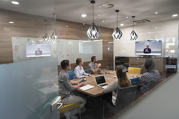 Image showing start up business people group attending videoconference call