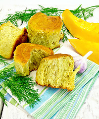 Image showing Scones pumpkin with garlic on light board