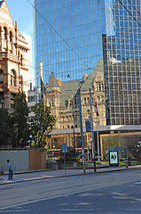 Image showing Reflection of old city hall in high rise.