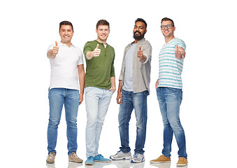 Image showing happy smiling men showing thumbs up over white