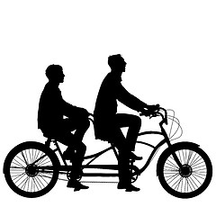 Image showing Silhouette of two athletes on tandem bicycle.