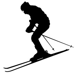 Image showing Mountain skier  speeding down slope. sport silhouette.