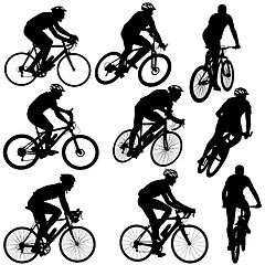 Image showing Set silhouette of a cyclist male and female.  