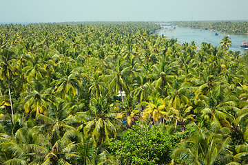 Image showing tropical river with trawlers in Southeast Asia