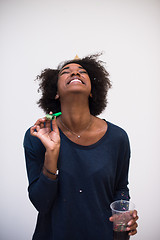 Image showing happy young woman celebrating