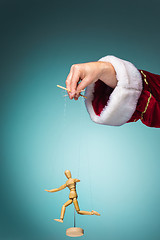 Image showing Image puppet in the hands of Santa