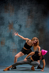 Image showing The two attractive girls dancing twerk in the studio