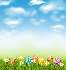 Image showing Easter natural landscape with traditional painted eggs in grass 