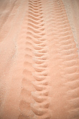 Image showing wheel track on sand