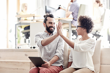 Image showing office workers with tablet pc making high five